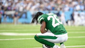 Sep 15, 2024; Nashville, Tennessee, USA;  New York Jets cornerback Brandin Echols (26) squats after the close win over the Tennessee Titans during the second half at Nissan Stadium. Mandatory Credit: Steve Roberts-Imagn Images