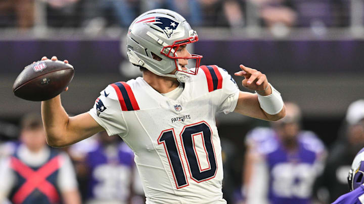 Aug 16, 2025; Minneapolis, Minnesota, USA;  New England Patriots quarterback Drake Maye (10) throws a pass against the Minnesota Vikings during the first quarter at U.S. Bank Stadium. Mandatory Credit: Jeffrey Becker-Imagn Images