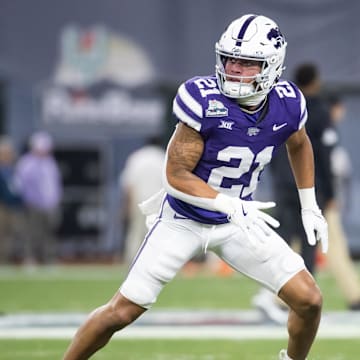 Dec 26, 2024; Phoenix, AZ, USA; Kansas State Wildcats safety Marques Sigle (21) against the Rutgers Scarlet Knights during the Rate Bowl at Chase Field. Mandatory Credit: Mark J. Rebilas-Imagn Images
