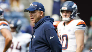 Sep 8, 2024; Seattle, Washington, USA; Denver Broncos head coach Sean Payton watches pregame warmups against the Seattle Seahawks at Lumen Field. 