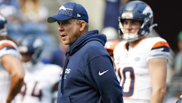Sep 8, 2024; Seattle, Washington, USA; Denver Broncos head coach Sean Payton watches pregame warmups against the Seattle Seahawks at Lumen Field. 