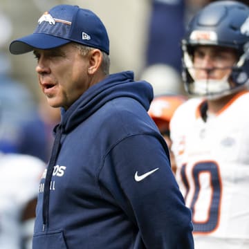 Sep 8, 2024; Seattle, Washington, USA; Denver Broncos head coach Sean Payton watches pregame warmups against the Seattle Seahawks at Lumen Field. 