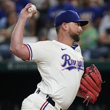 Aug 31, 2024; Arlington, Texas, USA; Texas Rangers relief pitcher Kirby Yates (39) throws to the plate during the ninth inning against the Oakland Athletics at Globe Life Field.