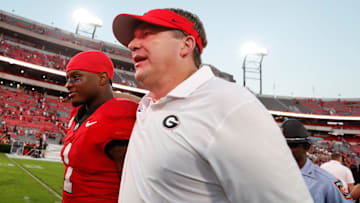 Georgia head coach Kirby Smart and Georgia running back Trevor Etienne (1) leave the field after winning a NCAA college football game against Auburn in Athens, Ga., on Saturday, Oct. 5, 2024. Georgia won 31-13.