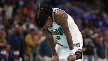 Apr 24, 2025; Memphis, Tennessee, USA; Memphis Grizzlies guard Ja Morant (12) waits to shoot a free throw during the second quarter against the Oklahoma City Thunder during game three for the first round of the 2024 NBA Playoffs at FedExForum. Mandatory Credit: Petre Thomas-Imagn Images