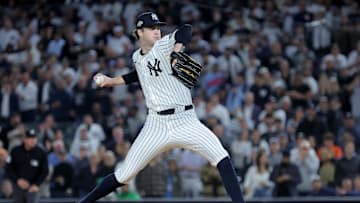 Oct 8, 2025; Bronx, New York, USA; New York Yankees starting pitcher Cam Schlittler (31) pitches against the Toronto Blue Jays during the first inning of game four of the ALDS round of the 2025 MLB playoffs at Yankee Stadium. Mandatory Credit: Brad Penner-Imagn Images