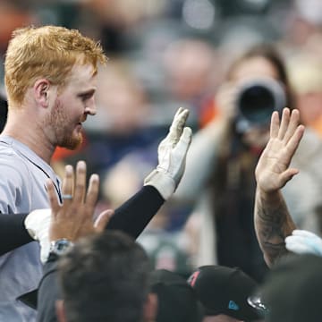 Sep 8, 2024; Houston, Texas, USA; Arizona Diamondbacks left fielder Pavin Smith (26) celebrates in the dugout after hitting a home run during the second inning against the Houston Astros at Minute Maid Park.