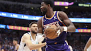 May 6, 2022; Dallas, Texas, USA; Phoenix Suns center Deandre Ayton (22) looks to shoot as Dallas Mavericks forward Maxi Kleber (42) defends during the second quarter in game three of the second round of the 2022 NBA playoffs at American Airlines Center. Mandatory Credit: Kevin Jairaj-Imagn Images
