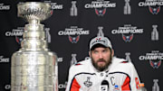 Washington Capitals left wing Alex Ovechkin speaks with media with the Stanley Cup displayed following the victory against the Vegas Golden Knights