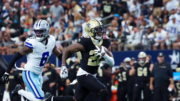 New Orleans Saints wide receiver Rashid Shaheed (22) catches a touchdown past Dallas Cowboys safety Donovan Wilson (6)  