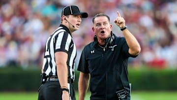 Nov 22, 2025; Columbia, South Carolina, USA; Coastal Carolina Chanticleers head coach Tim Beck disputes a call against the South Carolina Gamecocks in the first quarter at Williams-Brice Stadium. Mandatory Credit: Jeff Blake-Imagn Images