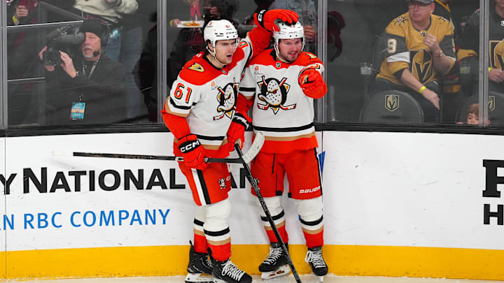 Dec 23, 2024; Las Vegas, Nevada, USA; Anaheim Ducks center Mason McTavish (23) celebrates with Anaheim Ducks left wing Cutter Gauthier (61) after scoring a goal against the Vegas Golden Knights during the third period at T-Mobile Arena. Mandatory Credit: Stephen R. Sylvanie-Imagn Images Dec 23, 2024; Las Vegas, Nevada, USA; Anaheim Ducks center Mason McTavish (23) celebrates with Anaheim Ducks left wing Cutter Gauthier (61) after scoring a goal against the Vegas Golden Knights during the third period at T-Mobile Arena. Mandatory Credit: Stephen R. Sylvanie-Imagn Images