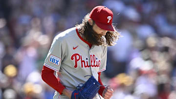 Jul 13, 2025; San Diego, California, USA; Philadelphia Phillies relief pitcher Matt Strahm (25) reacts after the Phillies defeated the San Diego Padres at Petco Park. Mandatory Credit: Denis Poroy-Imagn Images