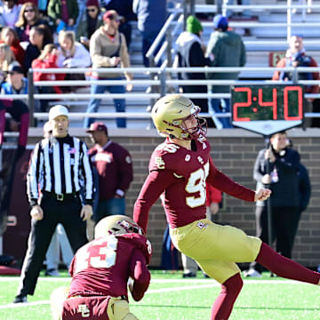 Nov 11, 2023; Chestnut Hill, Massachusetts, USA; Boston College Eagles place kicker Liam Connor (95) kicks an extra point against the Virginia Tech Hokies during the first half at Alumni Stadium. Mandatory Credit: Eric Canha-Imagn Images