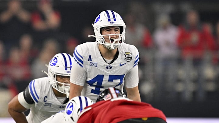 Dec 6, 2025; Arlington, TX, USA; BYU Cougars quarterback Bear Bachmeier (47) sets the play against the Texas Tech Red Raiders during the first half at AT&T Stadium. Mandatory Credit: Jerome Miron-Imagn Images