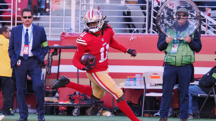 Nov 19, 2023; Santa Clara, California, USA; San Francisco 49ers wide receiver Brandon Aiyuk (11) runs after a catch for a 76-yard touchdown against the Tampa Bay Buccaneers during the third quarter at Levi's Stadium. Mandatory Credit: Kelley L Cox-USA TODAY Sports