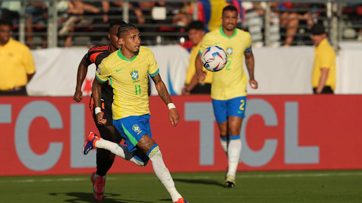 Jul 2, 2024; Santa Clara, CA, USA; Brazil midfielder Raphinha (11) pursues the ball against Colombia midfielder Jhon Arias (obscured) during the second half at Levi's Stadium. Mandatory Credit: Darren Yamashita-Imagn Images Jul 2, 2024; Santa Clara, CA, USA; Brazil midfielder Raphinha (11) pursues the ball against Colombia midfielder Jhon Arias (obscured) during the second half at Levi's Stadium. Mandatory Credit: Darren Yamashita-Imagn Images