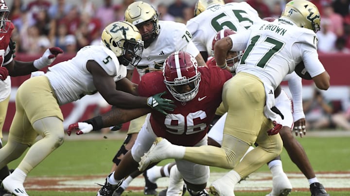 Sep 7, 2024; Tuscaloosa, Alabama, USA;  Alabama Crimson Tide defensive lineman Tim Keenan III (96) tackles South Florida Bulls quarterback Byrum Brown (17) during the first half at Bryant-Denny Stadium. Mandatory Credit: Gary Cosby Jr.-Imagn Images