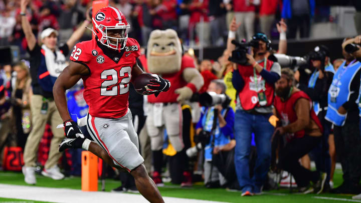 Jan 9, 2023; Inglewood, CA, USA; Georgia Bulldogs running back Branson Robinson (22) scores a touchdown against the TCU Horned Frogs during the second half in the CFP national championship game at SoFi Stadium. Mandatory Credit: Gary A. Vasquez-USA TODAY Sports