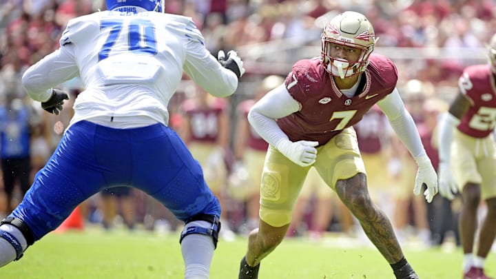 Sep 14, 2024; Tallahassee, Florida, USA; Florida State Seminoles defensive lineman Marvin Jones Jr. (7) pressures against the Memphis Tigers during the first half at Doak S. Campbell Stadium. Mandatory Credit: Melina Myers-Imagn Images