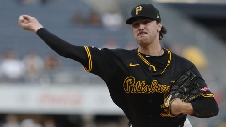 Aug 22, 2024; Pittsburgh, Pennsylvania, USA;  Pittsburgh Pirates starting pitcher Paul Skenes (30) pitches against the Cincinnati Reds during the fourth inning at PNC Park. Mandatory Credit: Charles LeClaire-USA TODAY Sports