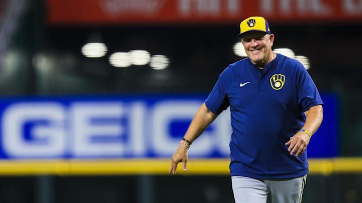 Aug 16, 2025; Cincinnati, Ohio, USA; Milwaukee Brewers manager Pat Murphy (49) walks off the field after a stop in play in the ninth inning against the Cincinnati Reds at Great American Ball Park. Mandatory Credit: Katie Stratman-Imagn Images