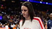 Aug 7, 2025; Phoenix, Arizona, USA; Indiana Fever injured guard Caitlin Clark in attendance against the Phoenix Mercury during an WNBA game at PHX Arena. Mandatory Credit: Mark J. Rebilas-Imagn Images