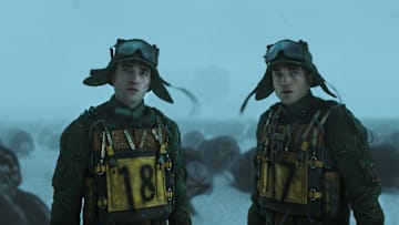 (L to r) ROBERT PATTINSON as Mickey 18 and ROBERT PATTINSON as Mickey 17 in “MICKEY 17,” a Warner Bros. Pictures release.