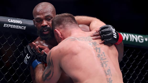 Jon Jones fighting Stipe Mioci
