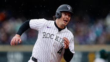 Apr 4, 2025; Denver, Colorado, USA; Colorado Rockies first baseman Michael Toglia (4) rounds third on an RBI in the fourth inning against the Athletics at Coors Field. Mandatory Credit: Isaiah J. Downing-Imagn Images