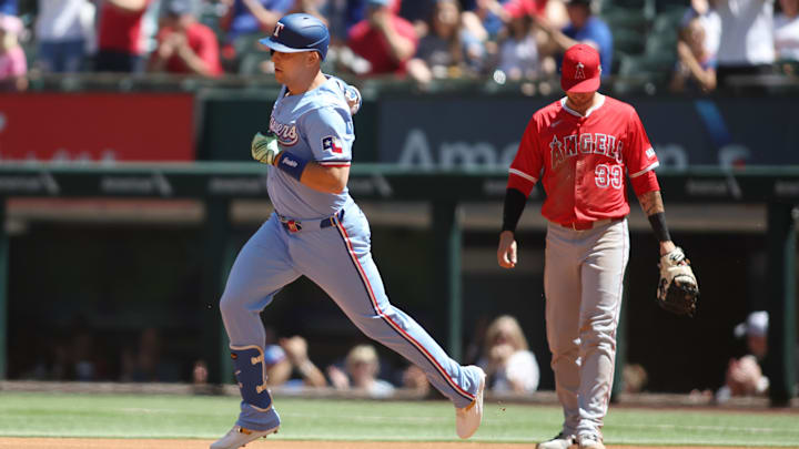 Sep 8, 2024; Arlington, Texas, USA; Texas Rangers first base Nathaniel Lowe (30) rounds the bases after hitting a two run home run against the Los Angeles Angels in the first inning at Globe Life Field. Mandatory Credit: Tim Heitman-Imagn Images