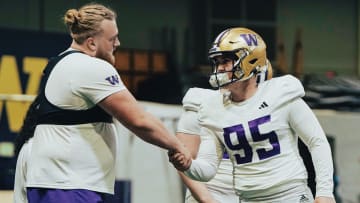 Landen Hatchett and Grady Gross share a practice moment. 