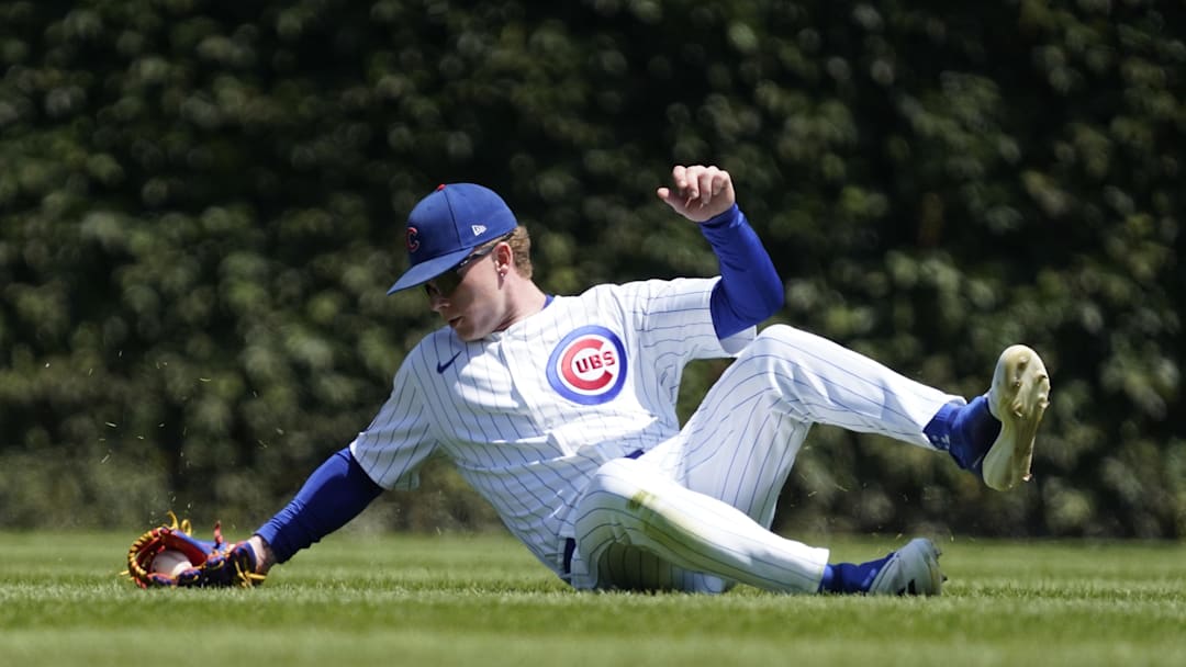 Aug 7, 2024; Chicago, Illinois, USA; Chicago Cubs outfielder Pete Crow-Armstrong (52) makes a catch on a ball hit by Minnesota Twins third baseman Jose Miranda (not pictured) during the first inning at Wrigley Field. Mandatory Credit: David Banks-Imagn Images