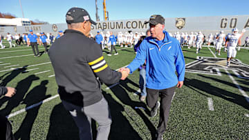 Nov 2, 2024; West Point, New York, USA; Air Force Falcons head coach Troy Calhoun shakes hands with Army Black Knights head coach Jeff Monken after Army’s 20-3 win at Michie Stadium. 
