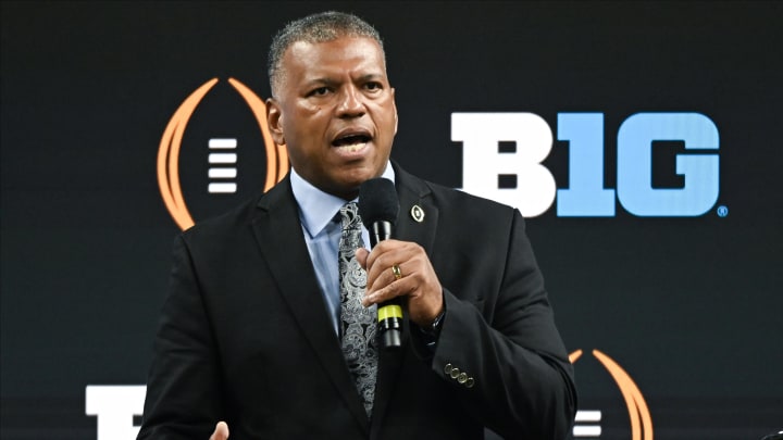 Jul 24, 2024; Indianapolis, IN, USA;  College Football Playoff executive director Richard M. Clark speaks to the media during the Big 10 football media day at Lucas Oil Stadium. Mandatory Credit: Robert Goddin-USA TODAY Sports