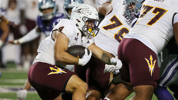 Arizona State Sun Devils running back Cam Skattebo (4) carries the ball against the Kansas State Wildcats