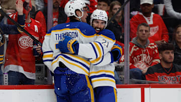 Nov 15, 2025; Detroit, Michigan, USA;  Buffalo Sabres center Tage Thompson (72) receives congratulations from defenseman Conor Timmins (21) after scoring in the third period against the Detroit Red Wings at Little Caesars Arena. Mandatory Credit: Rick Osentoski-Imagn Images