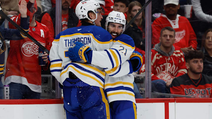 Nov 15, 2025; Detroit, Michigan, USA;  Buffalo Sabres center Tage Thompson (72) receives congratulations from defenseman Conor Timmins (21) after scoring in the third period against the Detroit Red Wings at Little Caesars Arena. Mandatory Credit: Rick Osentoski-Imagn Images