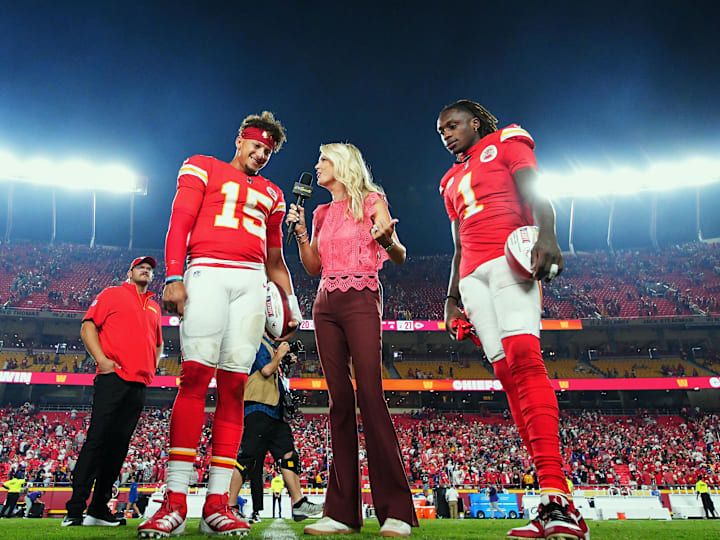 Kansas City Chiefs quarterback Patrick Mahomes (15) and wide receiver Xavier Worthy (1) talk with reporter Melissa Stark after defeating the Baltimore Ravens