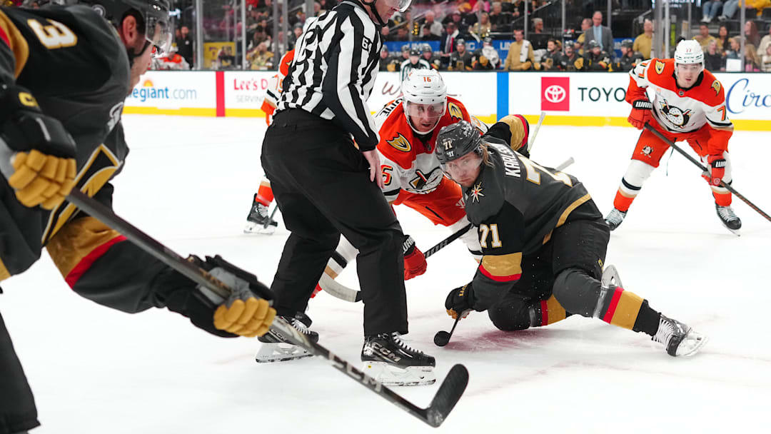 Dec 23, 2024; Las Vegas, Nevada, USA; Anaheim Ducks center Ryan Strome (16) wins a face off against Vegas Golden Knights center William Karlsson (71) during the first period at T-Mobile Arena. Mandatory Credit: Stephen R. Sylvanie-Imagn Images