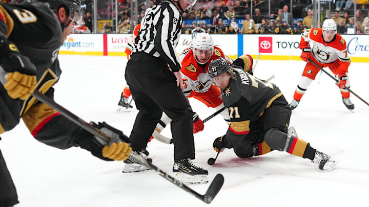 Dec 23, 2024; Las Vegas, Nevada, USA; Anaheim Ducks center Ryan Strome (16) wins a face off against Vegas Golden Knights center William Karlsson (71) during the first period at T-Mobile Arena. Mandatory Credit: Stephen R. Sylvanie-Imagn Images