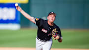 May 24, 2024; Charlotte, NC, USA; Louisville Cardinals utility Tucker Biven (22) pitches in the eighth inning against the Clemson Tigers during the ACC Baseball Tournament at Truist Field. Mandatory Credit: Scott Kinser-Imagn Images