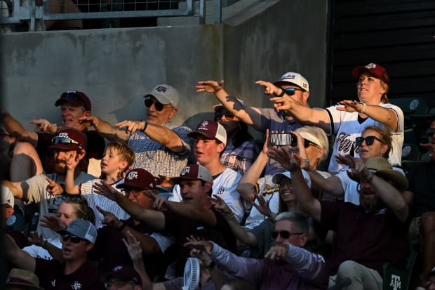 Texas A&M fans chant during the fourth inning against Oregon at Olsen Field, Blue Bell Park.