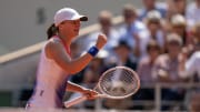 Jun 6, 2024; Paris, France; Iga Swiatek of Poland celebrates winning her match against Coco Gauff of the United States on day 12 of Roland Garros at Stade Roland Garros. Mandatory Credit: Susan Mullane-USA TODAY Sports