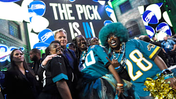 NFL Commisioner Roger Goodell poses with Jaguars fans during the first round of the NFL Draft Thursday, April 25, 2019, in Nashville, Tenn.