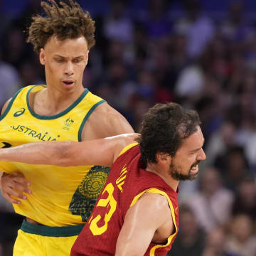 Jul 27, 2024; Villeneuve-d'Ascq, France; Spain guard Sergio Llull (23) gets past Australia point guard Dyson Daniels (1)  in men's Group A play during the Paris 2024 Olympic Summer Games at Stade Pierre-Mauroy. Mandatory Credit: John David Mercer-USA TODAY Sports