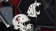 Sep 11, 2021; Pullman, Washington, USA; Washington State Cougars helmet sits during a game against the Portland State Vikings in the second half at Gesa Field at Martin Stadium. The Cougars won 44-24. Mandatory Credit: James Snook-Imagn Images