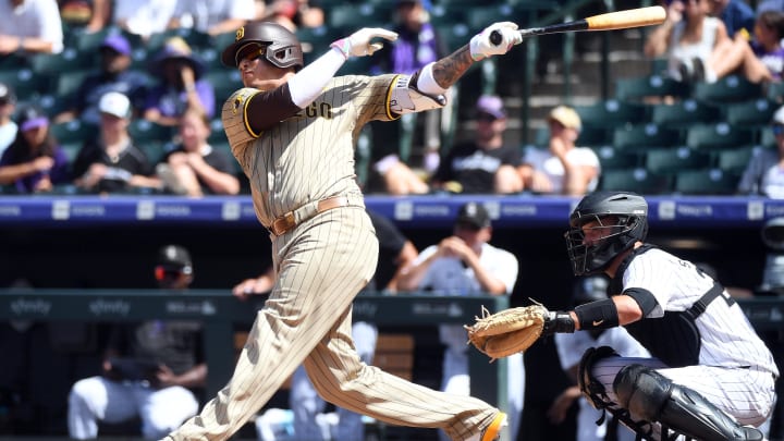 Aug 18, 2024; Denver, Colorado, USA; San Diego Padres third baseman Manny Machado (13) lines out to end the fifth inning against the Colorado Rockies at Coors Field. Mandatory Credit: Christopher Hanewinckel-USA TODAY Sports