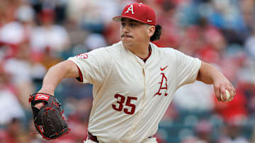 Landon Beidelschiers delivers a pitch for the Arkansas Razorbacks. 
