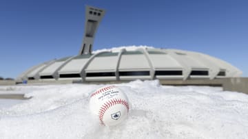 Mar 26, 2019; Montreal, Quebec, CAN; General view of the Olympic Stadium with a baseball in the snow before a spring training game between the Milwaukee Brewers and the Toronto Blue Jays. Mandatory Credit: Eric Bolte-Imagn Images